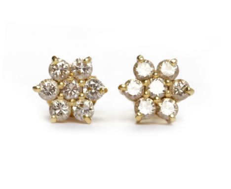 PAIR OF EIGHTEEN CARAT GOLD COLOURED DIAMOND SET STUDSeach with cognac coloured stones in a daisy cluster motif, 2.5g gross