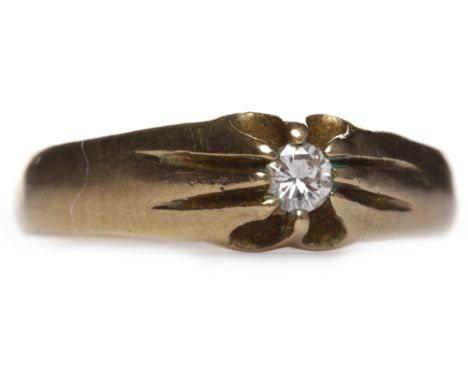 VICTORIAN STYLE DIAMOND SINGLE STONE RINGwith a single round brilliant cut stone of approximately 0.10 carats on a broad tape