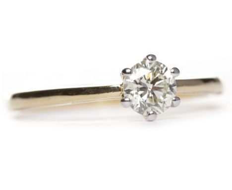 DIAMOND SOLITAIRE RINGthe round brilliant cut diamond of approximately 0.35 carats in eighteen carat gold, size J-K, 2.4g