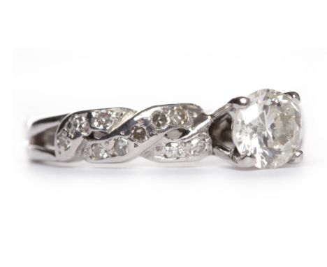 ORNATE DIAMOND SOLITAIRE RINGthe four claw set round brilliant cut diamond of approximately 0.62 carats on pierced twist moti