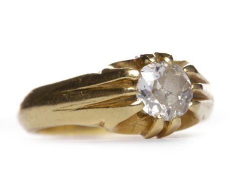 GENTLEMAN'S DIAMOND SINGLE STONE RINGthe old cushion cut diamond of approximately 0.90 carats in a broad tapered setting, in 