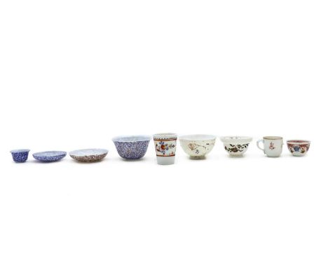 A group of opaque white and enamelled glass items,18th century, probably Staffordshire, comprising three mottled pieces, the 