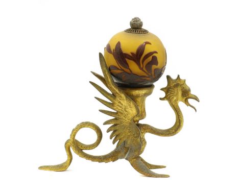 Emile Galle (1846-1904),a cameo glass globular lampshade, cased and cut with flowers, mounted on a gilt metal dragon form bas