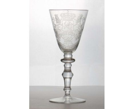 A light baluster armorial glass,probably 20th century, in the 18th century style, the funnel bowl engraved with coat of arms 