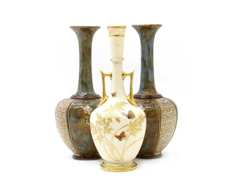 A Royal Worcester porcelain blush ivory vaseelongated neck above globular body decorated with butterflies amongst foliage25.5