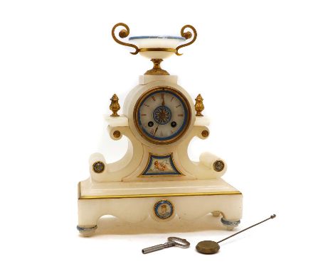 A white onyx mantel clock,20th century, French, with urn surmount and gilt-metal embellishment, the painted circular dial wit