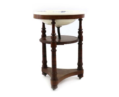 A Victorian mahogany washstand,with a ceramic bowl top, marked TS Brown Westhead Moore &amp; Co, raised on a mahogany stand w