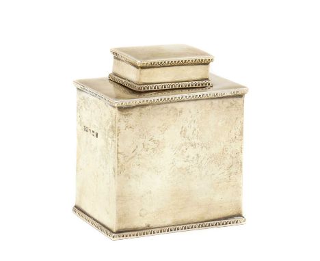 A silver tea caddy,by Charles Weale, Birmingham 1912, of rectangular form with beaded edge detail,8cm high,5oztCondition Repo