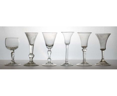 A group of plain stem drinking glasses,18th century and later, comprising a mead glass, c.1750, with a gadrooned bowl, over a