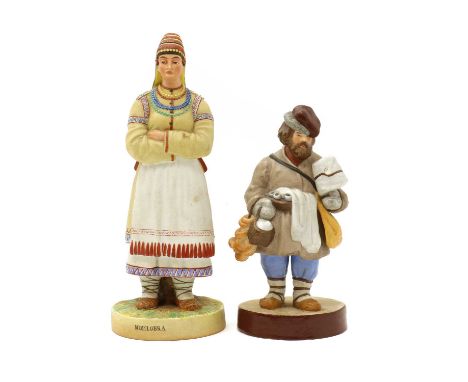 A Gardner porcelain figure,late 19th century, of a tea and bagel vendor, red factory stamp and impressed marks,19cm hightoget