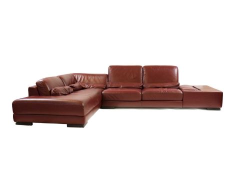 A Roche Bobois red leather corner sofa,of recent manufacture, labelled, in two sections,first section 236cm wide110cm deep85c