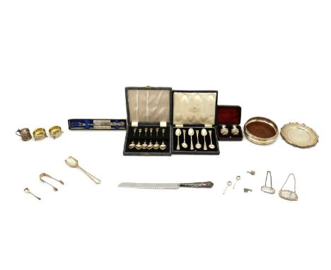 A collection of silver items,to include a cased set of six teaspoons, Sheffield 1932, another set marked 917 standard, the en