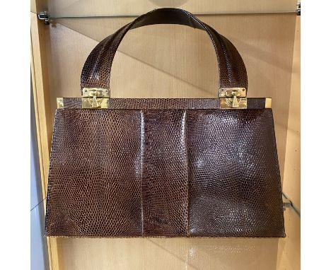 A vintage Jane Shilton lizard skin handbag, W. 32cm.