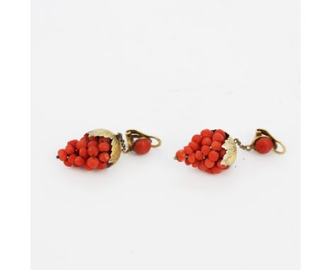 A pair of silver gilt mounted coral bunch of grapes shaped drop earrings, L. 4cm. Clip on backs.
