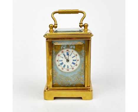 A miniature gilt brass carriage clock, H. 7.5cm.