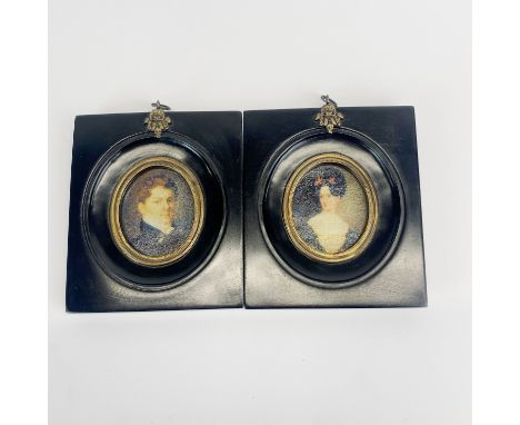 A pair of Georgian style reproduction portrait miniatures, H. 12.5cm.
