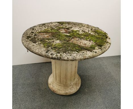 A vintage concrete garden table, H. 55cm Dia. 66cm.