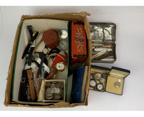 A box containing various vintage watches, pen knives, etc.