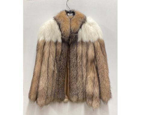 A lady's vintage fox fur jacket.