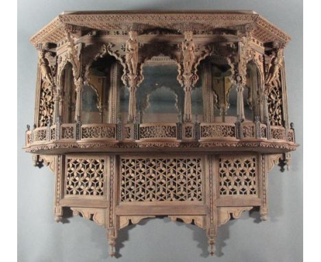 AN ANGLO-INDIAN SHELF BRACKET Punjab, Northern India, 19th century carved wood, in the form of a pavilion, with lobed balustr