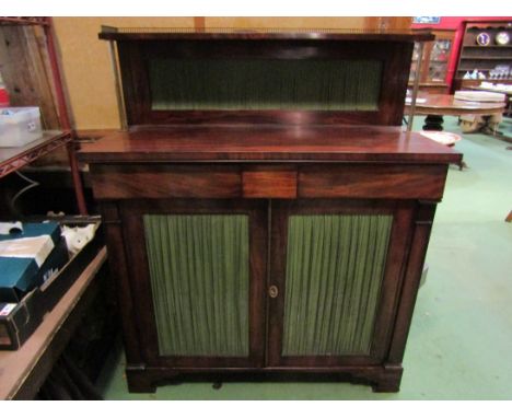 A circa 1800 mahogany chiffonier the three quarter pierced brass gallery and raised shelf on reeded brass supports over two f