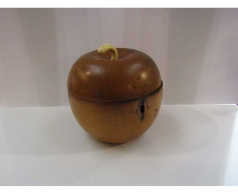 A 19th Century fruitwood apple form tea caddy, 12.5cm tall approx.       