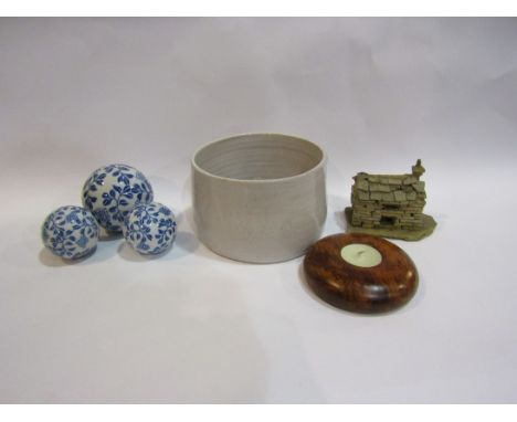 A Studio pottery bowl, Yorkshire stone cottage, blue and white ceramic balls etc (6)