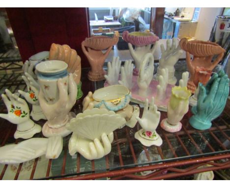 A group of ceramic hand ornaments including vases, pots and toast rack