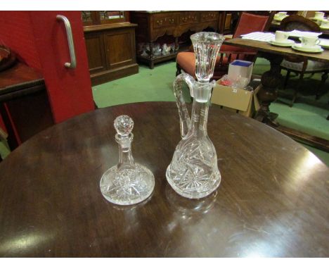 A cut glass claret jug and cut glass liqueur decanter