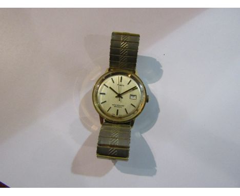 TIMEX: A steel and gold plated cased gent's automatic wristwatch, silvered dial with date and centre seconds, dial numbered 4
