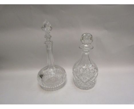 An Edwardian crystal glass decanter with spire finial stopper and Royal Doulton decanter