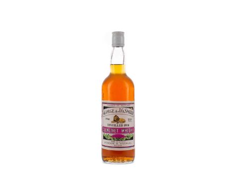 GLENLIVET 1938 GEORGE &amp; J.G SMITHSingle Malt Scotch Whisky26 2/3 fl.oz (75.7cl), 70° proof.Condition report: Some wear to
