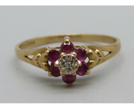 A 9ct gold, ruby and diamond cluster ring, 1.4g, N 