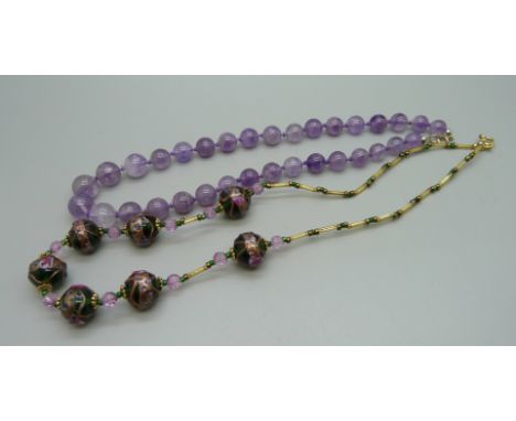 An amethyst bead necklace and a Murano 'Wedding Cake' bead necklace 