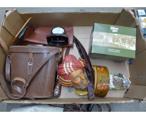 A box containing assorted items including a pair of ice skates and a wagon and horses novelty clock lamp **PLEASE NOTE THIS L