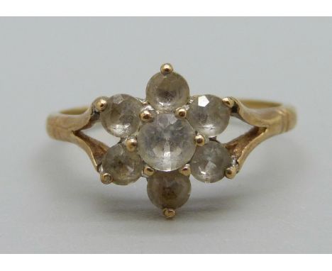 A 9ct gold, seven stone paste flower ring, 2g, P 