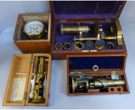A R&amp;J Beck gilt brass microscope, numbered 8465 with additional eyepieces, two other microscopes and a compass 