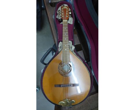 A Celtic Star electric/acoustic mandolin, cased 