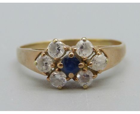 A 9ct gold, seven stone cluster ring, 2.6g, U 