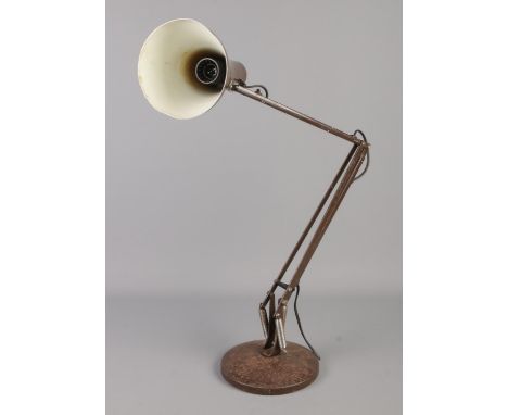 An Anglepoise Lighting Ltd. desk lamp, stamped to the inside of the base.  Cable has been cut, paint flaking. Needs restorati