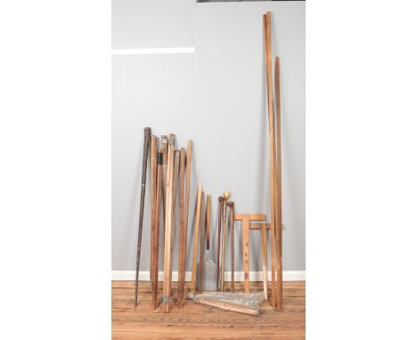 Collection of woodenware to include walking sticks, snooker que and rulers  