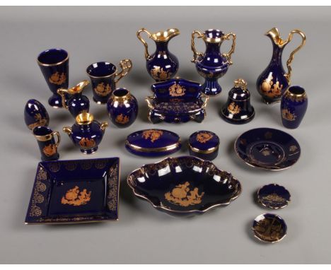 A collection of Limoges porcelain ornaments including novelty sofa trinket box, miniature cabinet plates, bell, etc.  