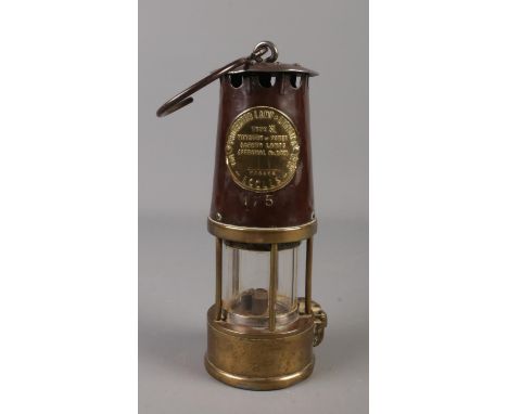An Eccles Type SL miners lamp by The Protector Lamp &amp; Lighting Co Ltd.  