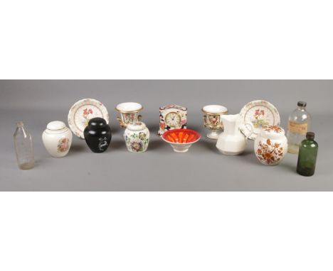 A collection of mainly ceramics, including Masons jugs, Poole bowl, lidded ginger jars and vintage glass bottles.  Damage to 