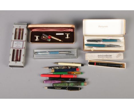 A collection of assorted pens including Stratton Telescopic pencil, Conway Stewart fountain pen and pencil, Rapidograph fine 