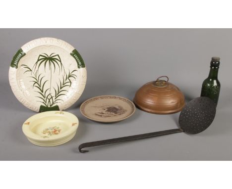 A quantity of assorted items, to include bread plate, Poole pottery plate, copper bed warmer and green glass bottle for 'Shef