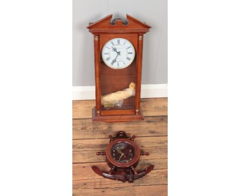 A London Clock Co. quarts pendulum wall clock with Westminster Whittington chime along with novelty anchor shaped quarts cloc