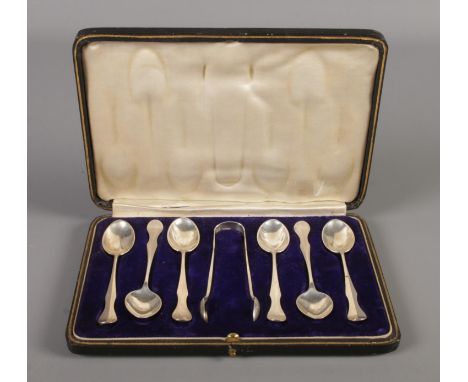 A cased set of silver coffee spoons and sugar tongs. Assayed for Glasgow 1906 &amp; 1907 by R &amp; W Sorley. Total silver we