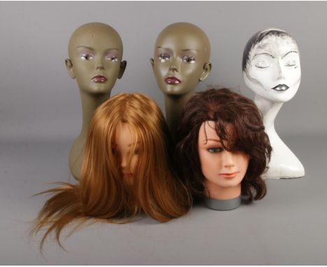 A collection of vintage mannequin display heads including Seba and wigged example.  
