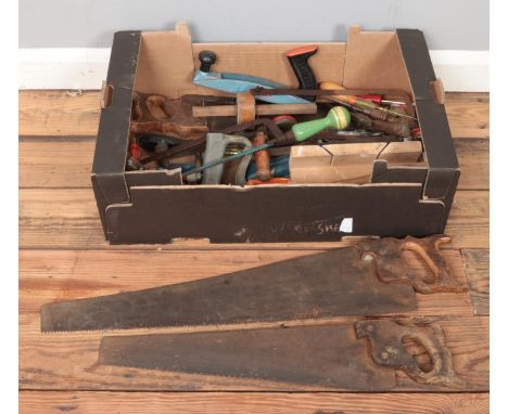 A box of vintage assorted tools, includes saws, hammers, screwdrivers etc.  